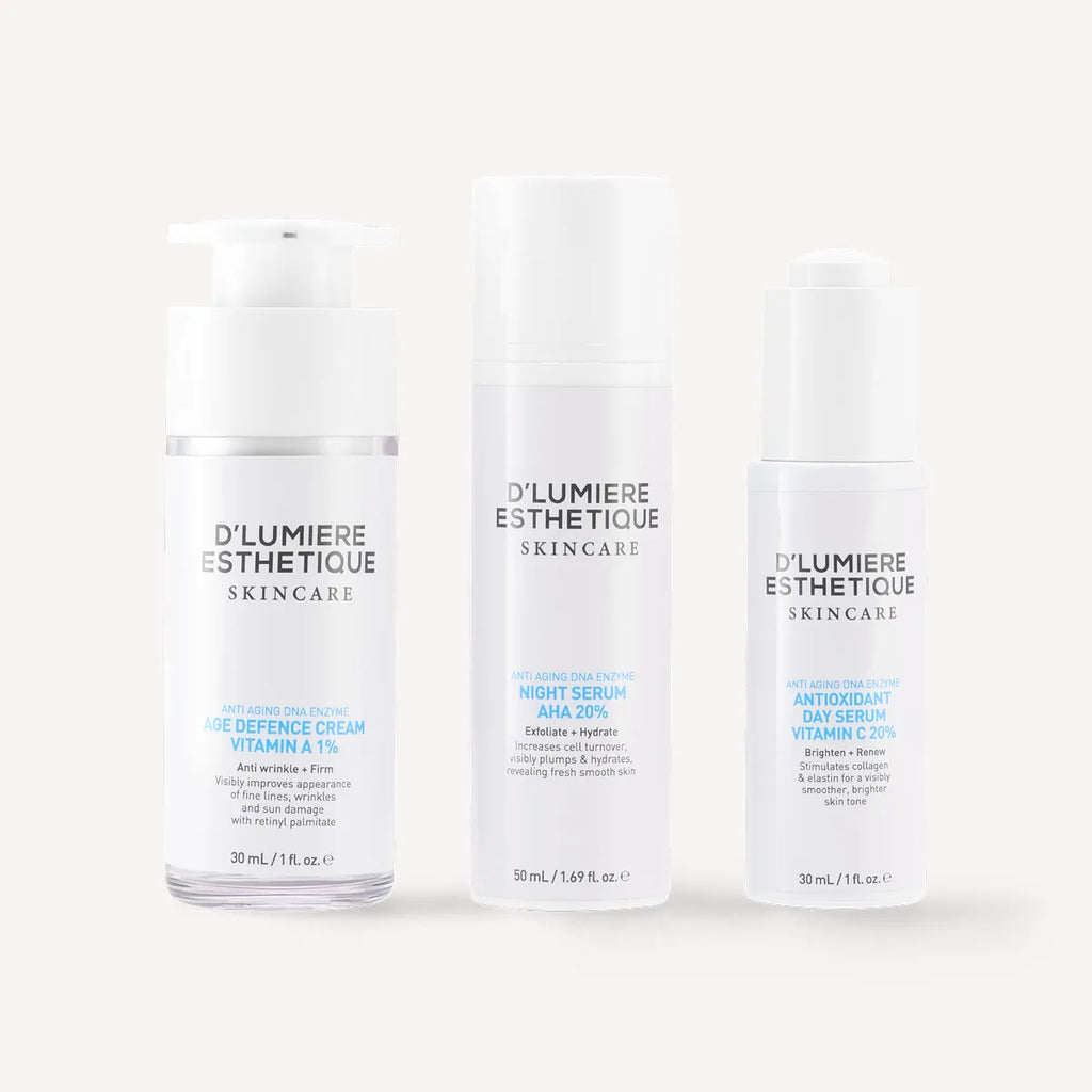 Three skincare bottles from D' Lumiere Esthetique on a white background