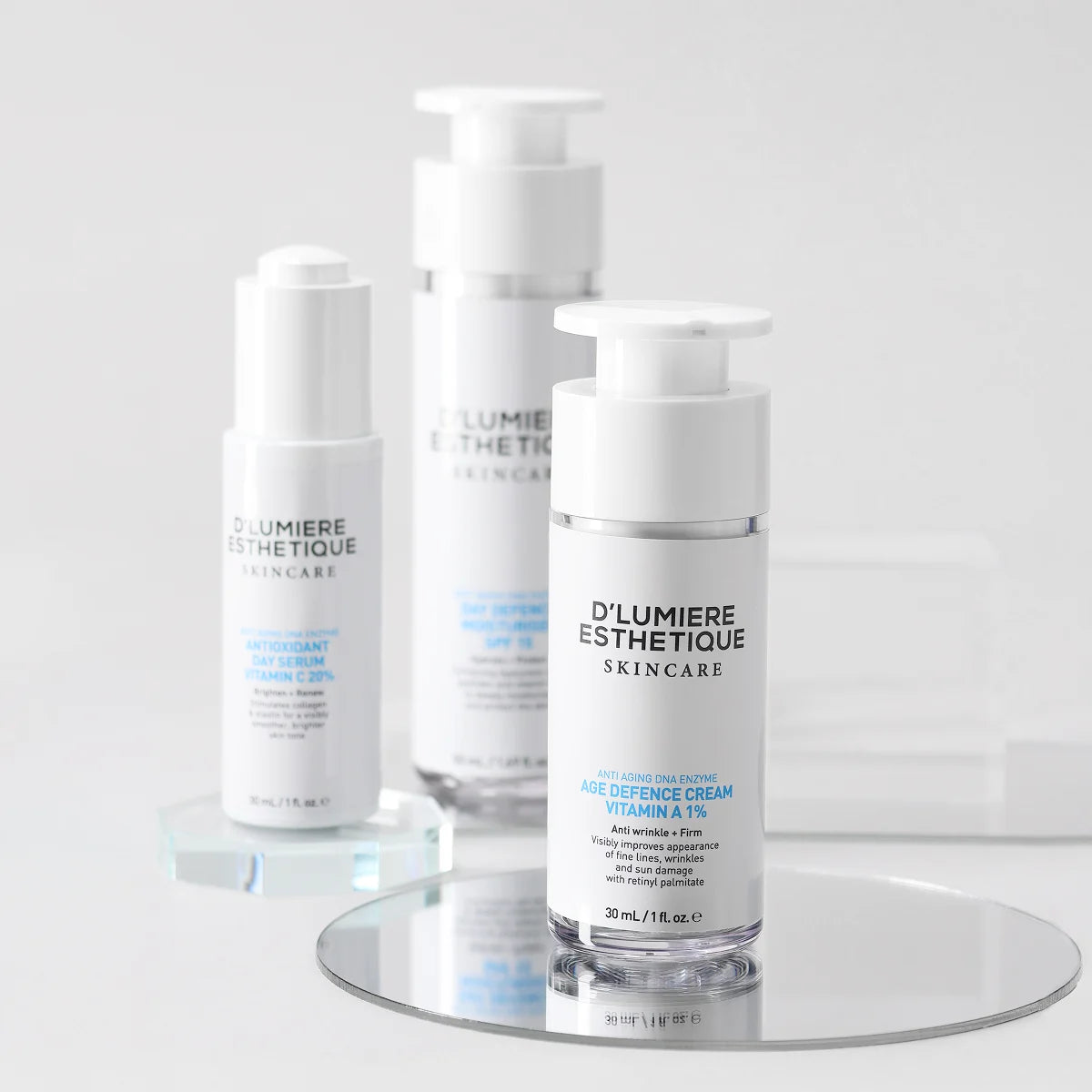 Délumèrie Esthétique skincare products on a clear stand with a white background