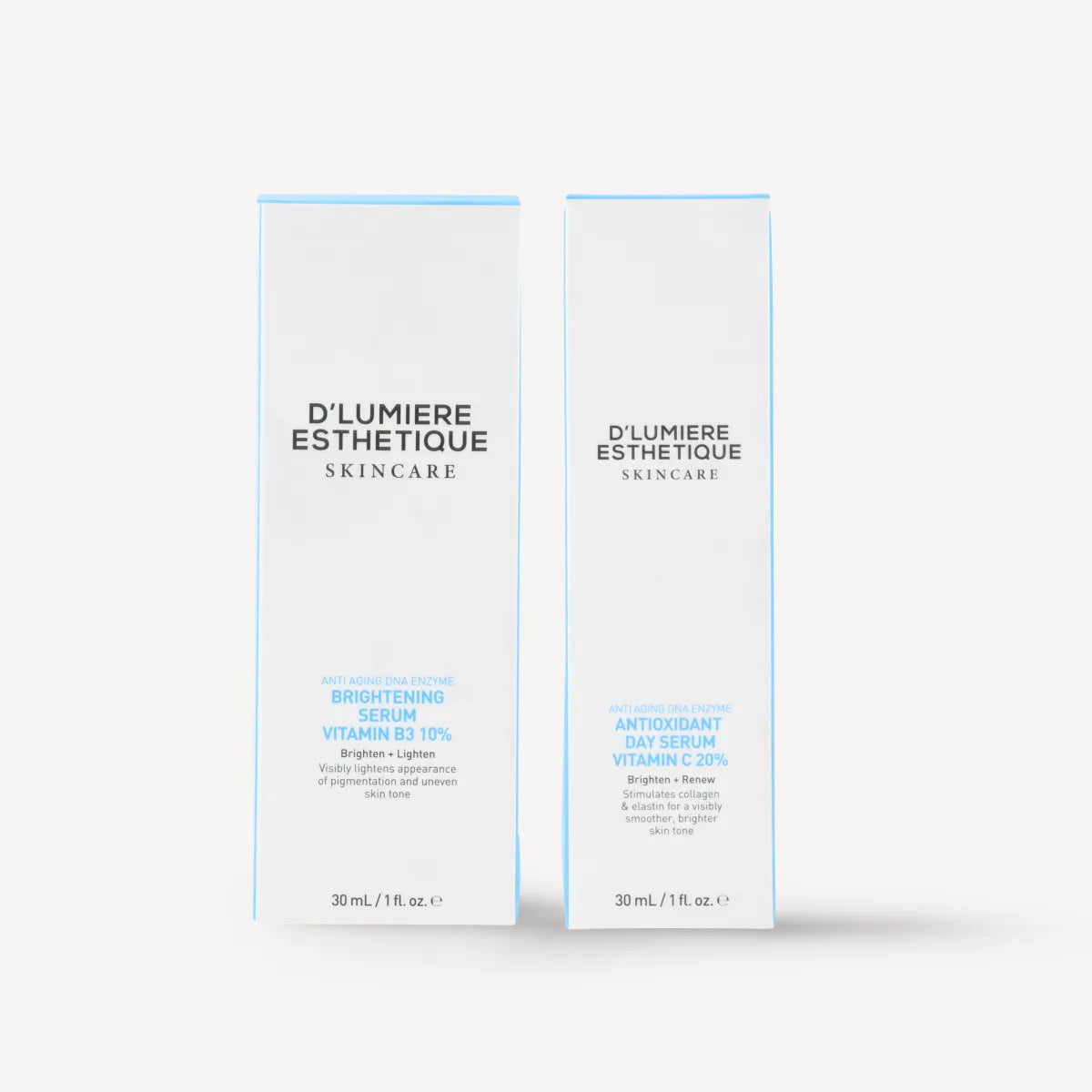 Two skincare serum packages from D'Lumiere Esthetique on a white background