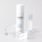 Skincare serum bottle with 'D'Lumiere Esthetique' branding on a white background