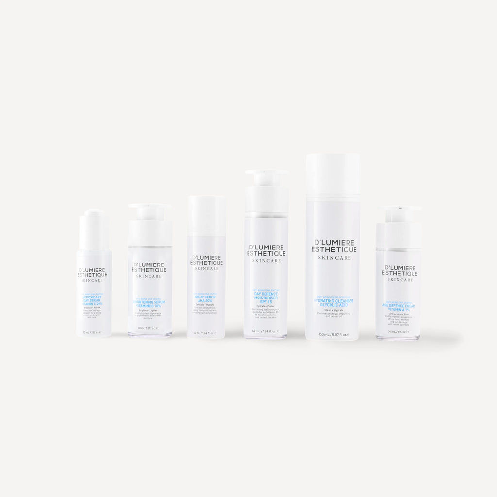 Set of skincare bottles labeled 'Lumiere Esthetique' on a white background