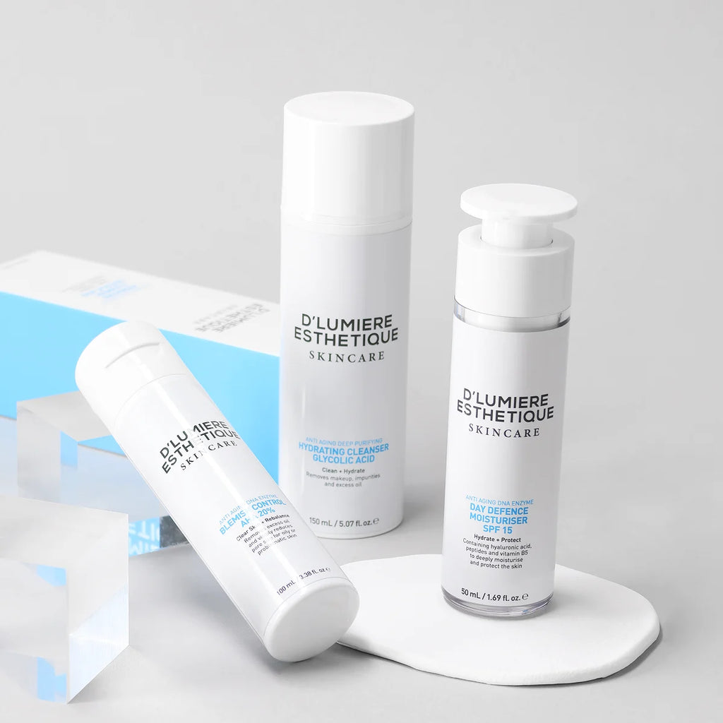 D'lumiere Esthetique skincare products on a light gray background