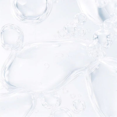Clear glass bowls with wavy patterns on a white background