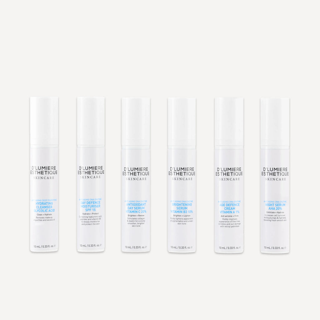 Set of skincare products from D'Lumiere Esthetique on a white background